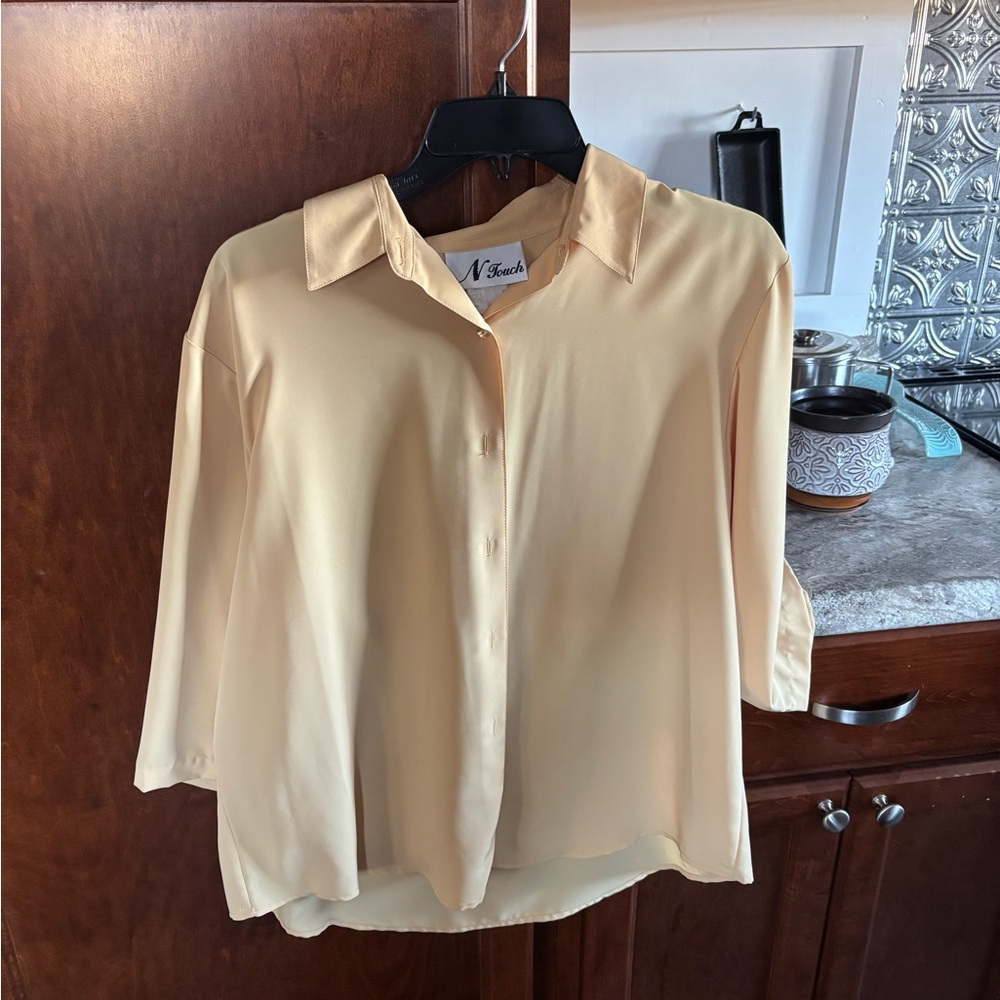 Satin tan shirt.